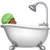 🛀🏾 person taking bath: medium-dark skin tone display on Apple